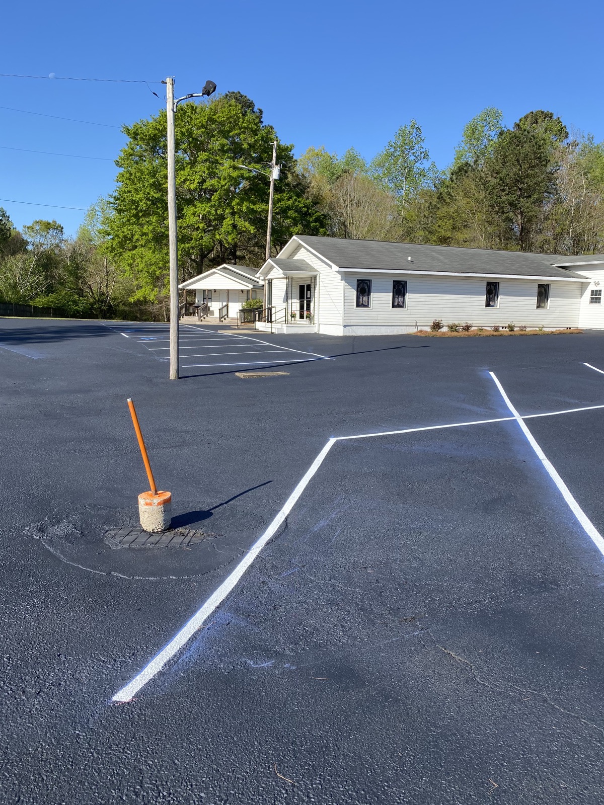 Completed church parking lot with fresh white striping