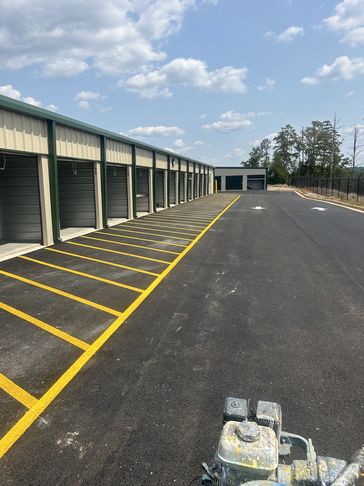 Fresh yellow striping at a commercial storage facility